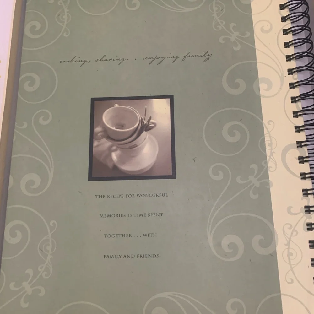Family Recipes Cookbook with Black, White, and Cream Cover